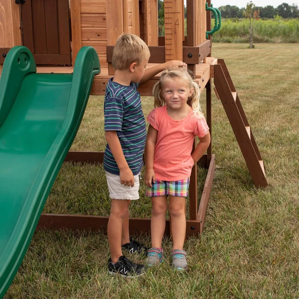 Heights Elevated Cedar Playhouse with Kitchen, Slide, Deck, Ladder & Growth Chart